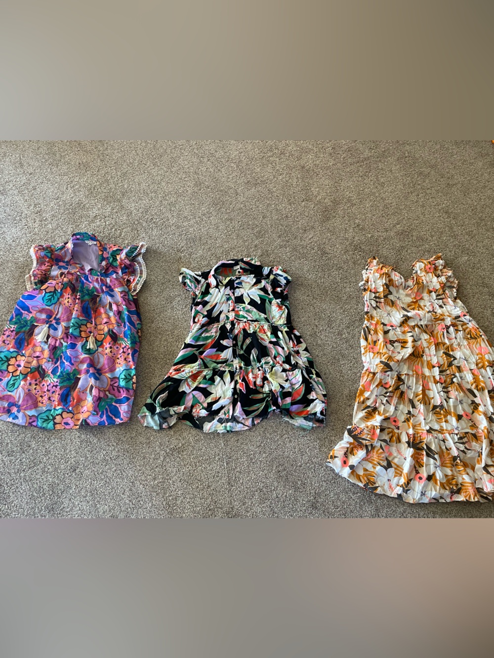 Bundle of 3 vibrant floral tropical flowy summer dresses.